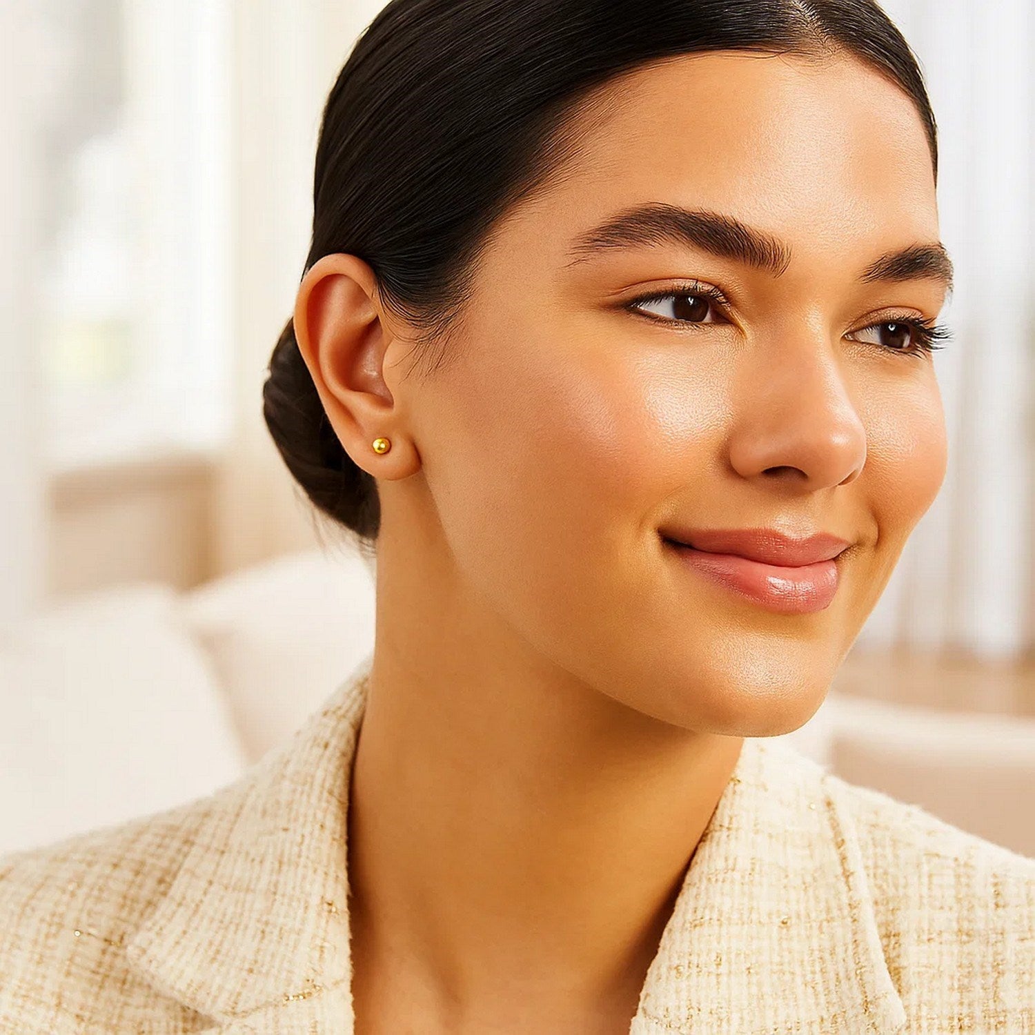 14k yellow gold polished ball style stud earrings, showcasing a classic design for timeless elegance.