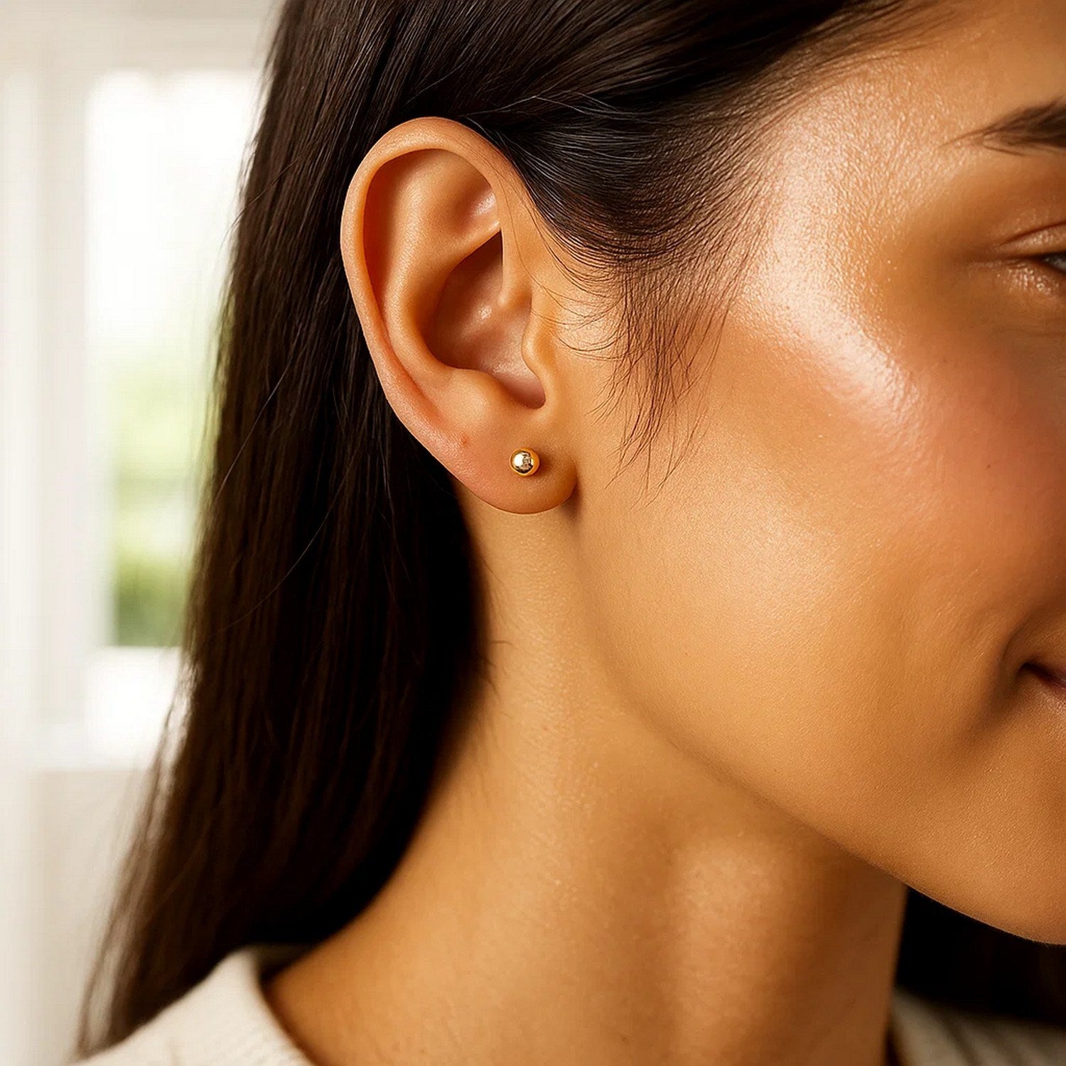14k yellow gold polished ball style stud earrings, embodying classic elegance and timeless luxury.