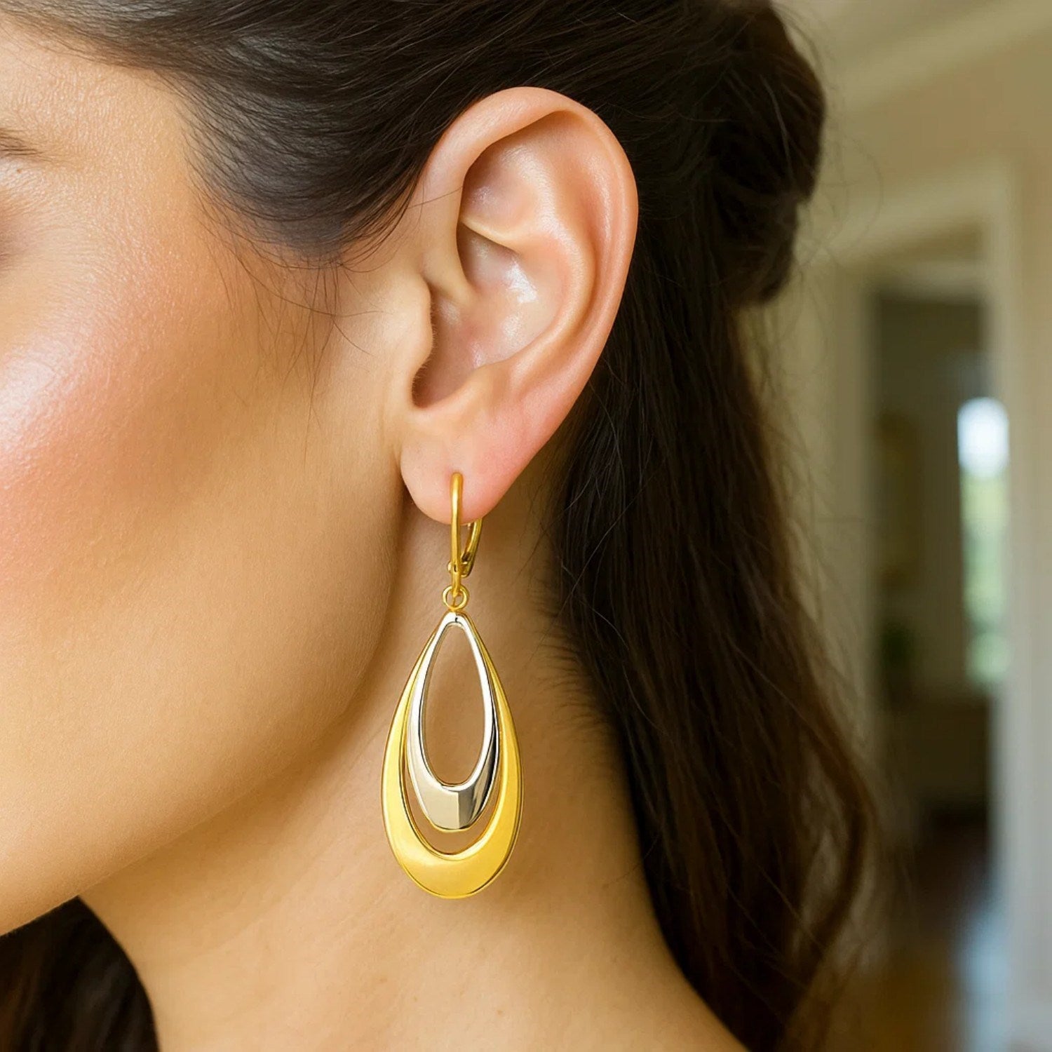 14k two-tone gold polished drop earrings featuring a sleek modern design, perfect for elegant occasions.