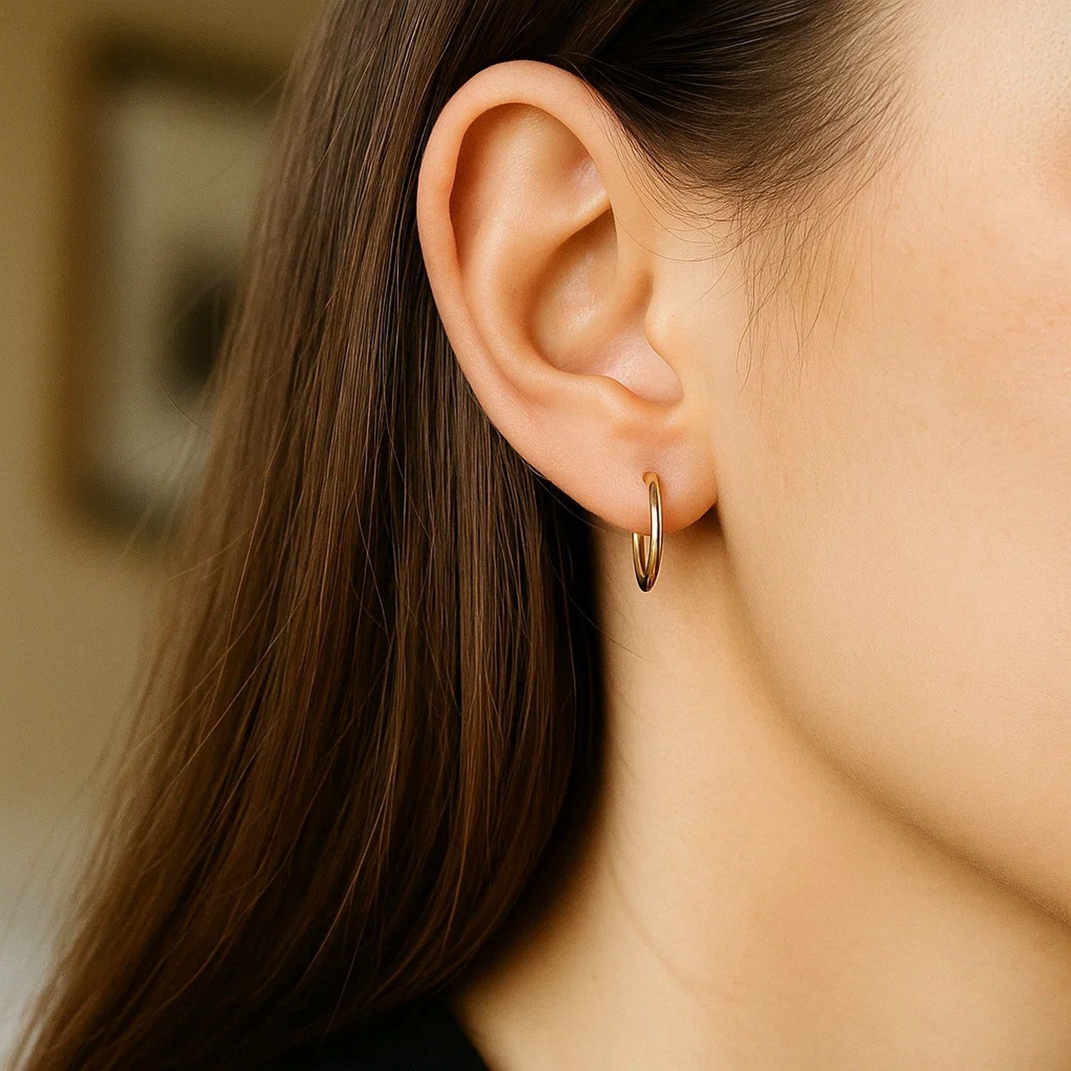 Elegant 14k yellow gold polished endless hoop earrings, showcasing a timeless design perfect for any occasion.