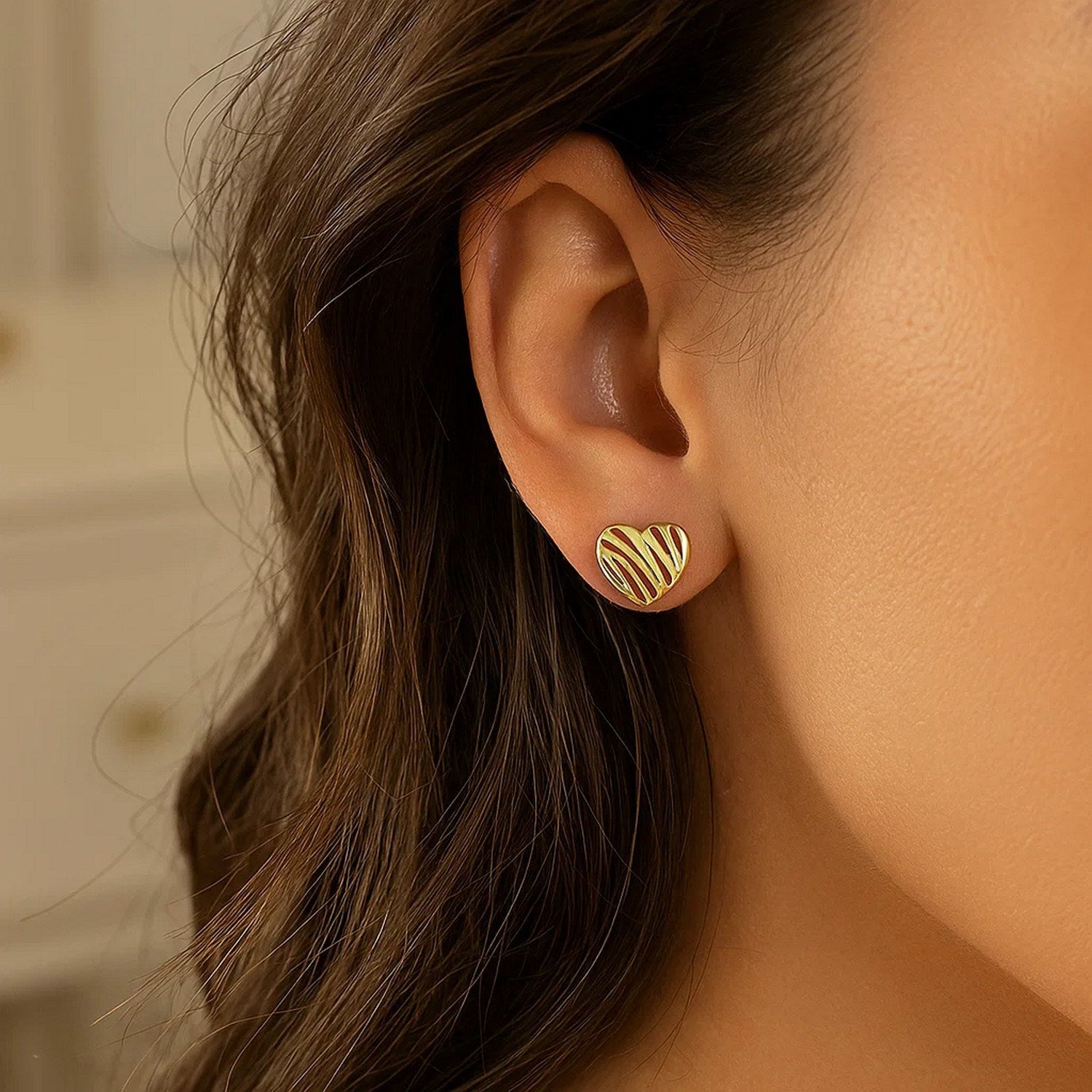 14K yellow gold high polish stud earrings featuring a modern scribble heart design, perfect for elegant occasions.