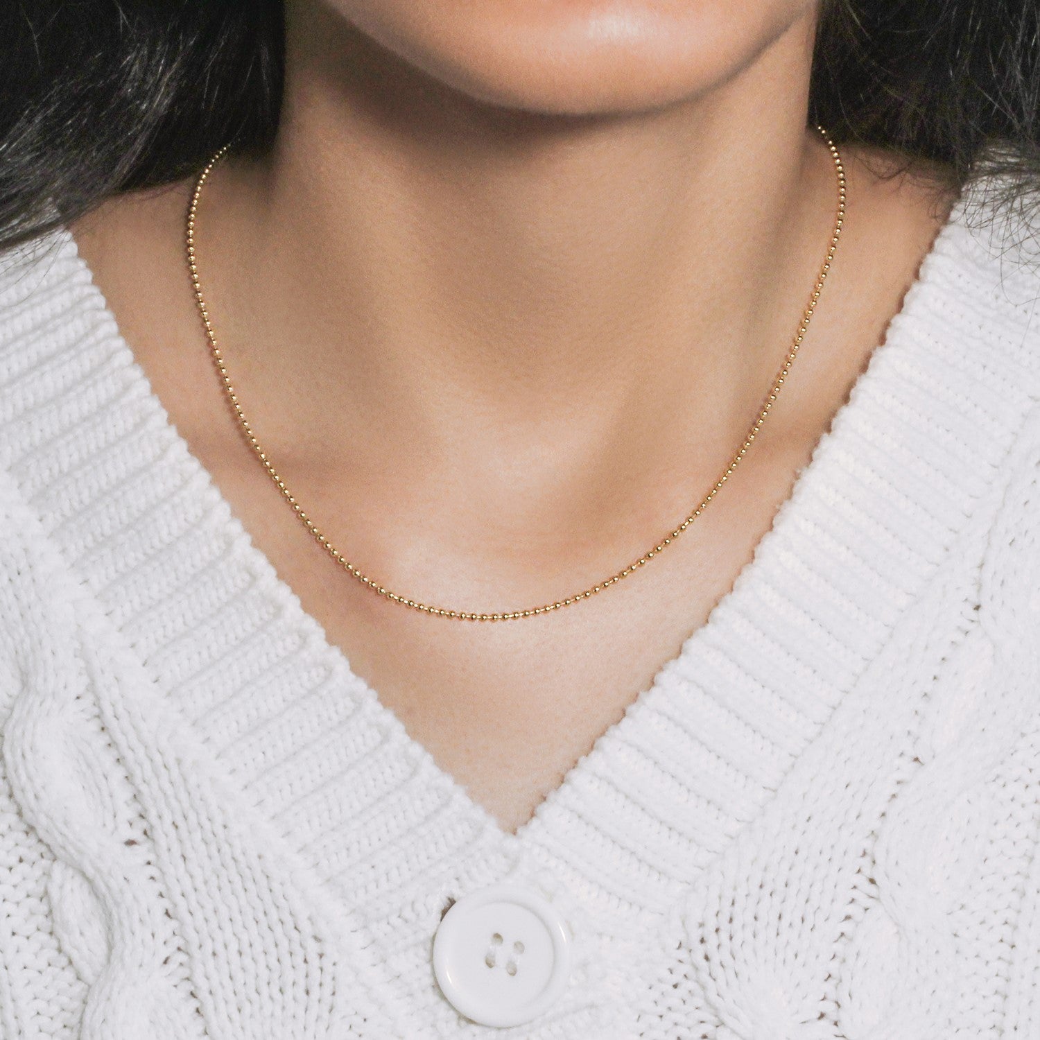 14k yellow gold bead chain necklace, 1.5mm minimalist design with sparkling diamond accents, perfect for layering.