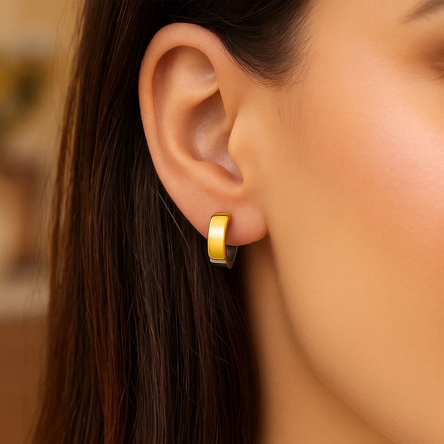 14k two-tone gold textured hoop earrings showcasing a modern design with exquisite craftsmanship and luxurious appeal.