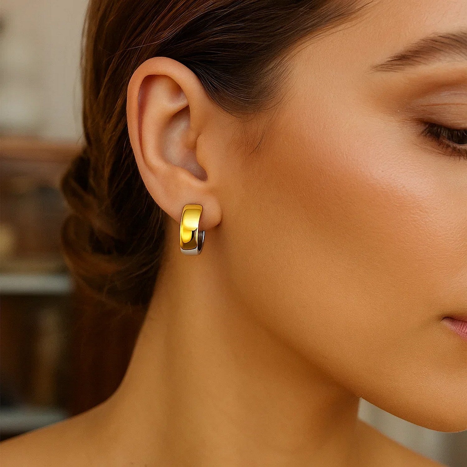 14k two-tone gold textured hoop earrings with a modern design, perfect for elevating any luxury jewelry collection.