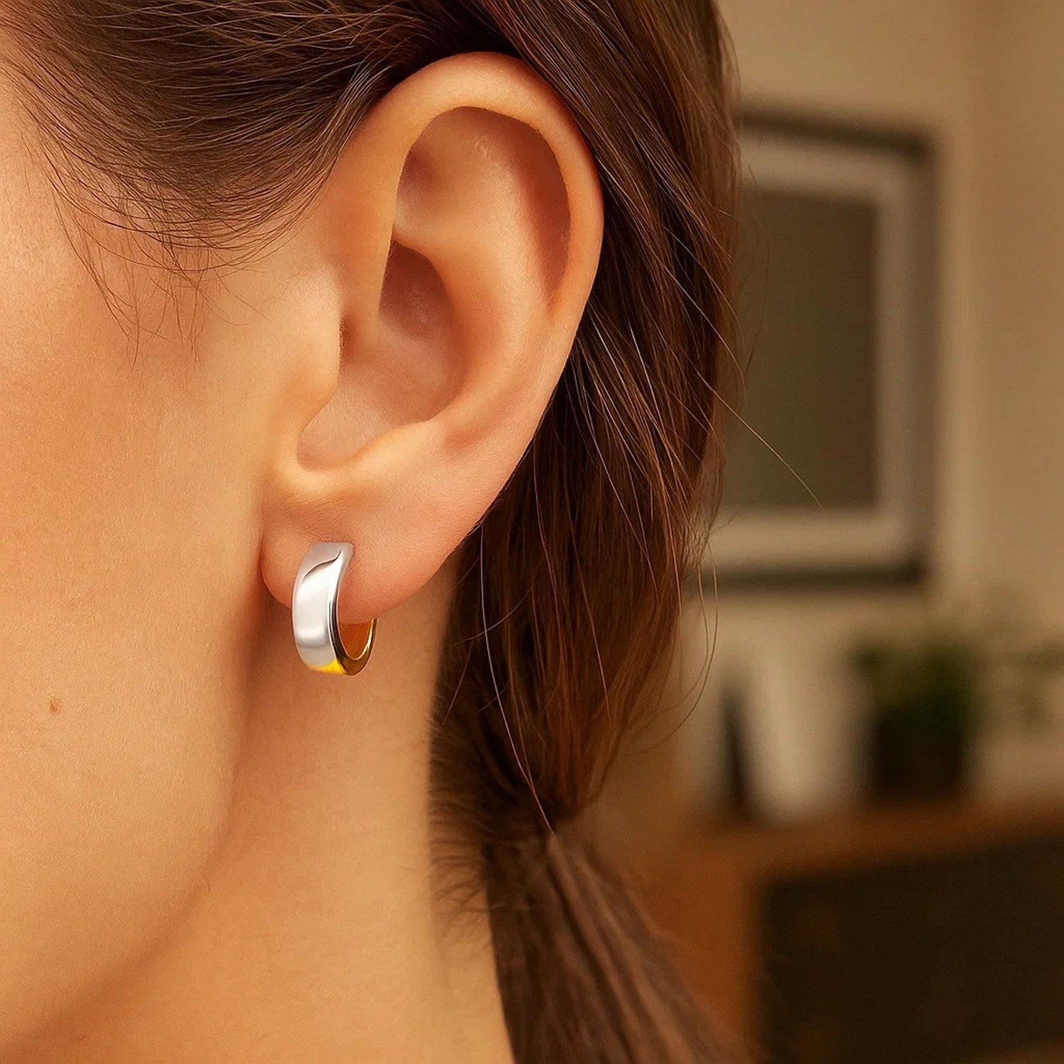 14k two-tone gold textured hoop earrings showcasing modern elegance and luxurious craftsmanship.