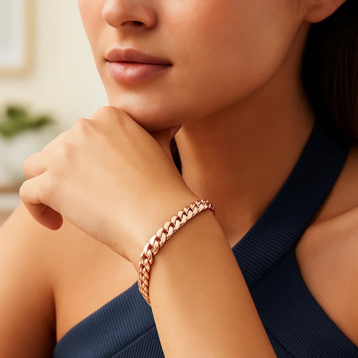 14k rose gold Cuban link bracelet with elegant chain design, showcasing luxurious craftsmanship and timeless style.