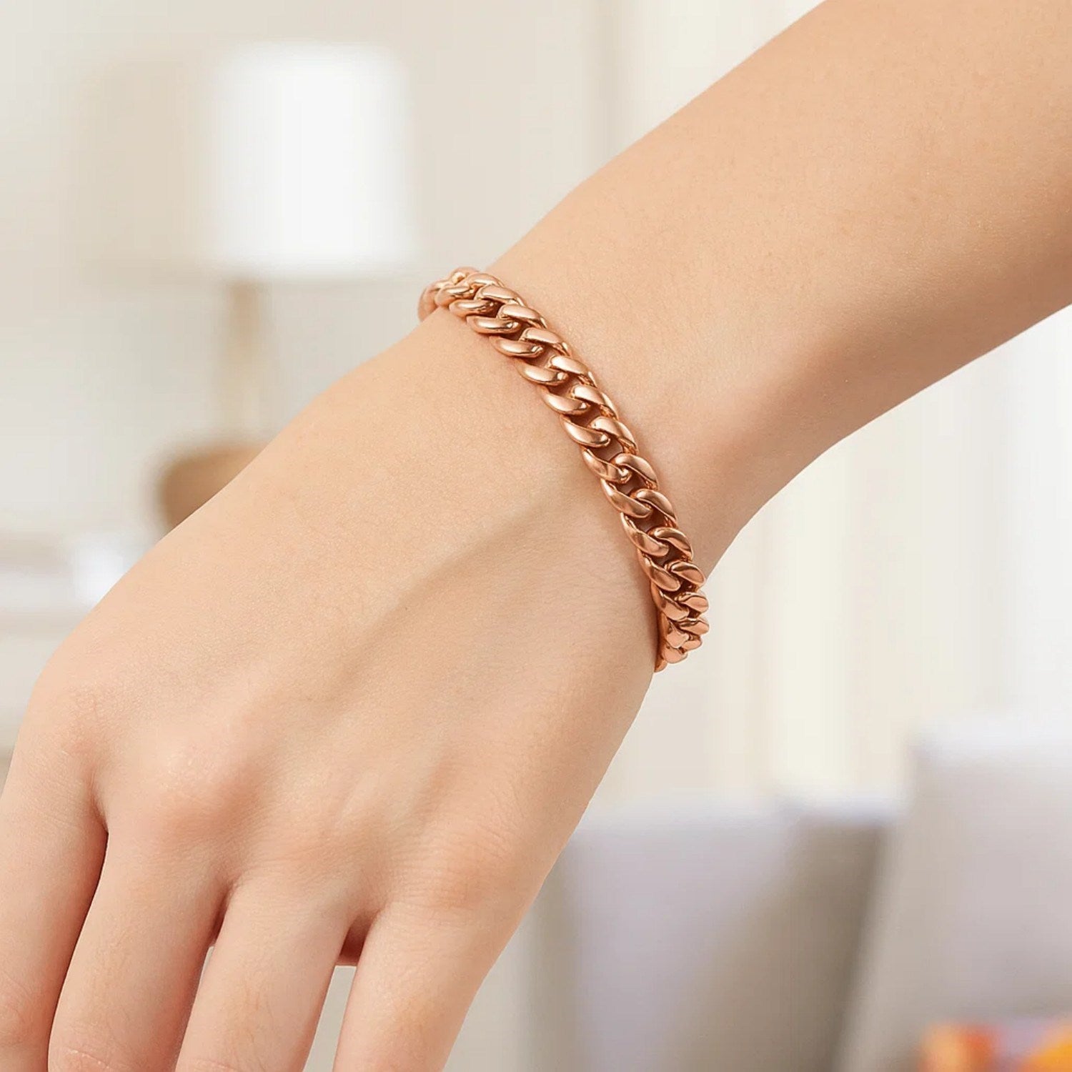 Elegant 14k rose gold Cuban link bracelet featuring a sleek chain design, perfect for luxury jewelry enthusiasts.