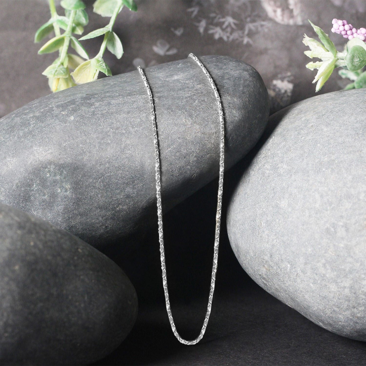 Elegant 14k white gold Lumina pendant chain showcasing a refined design and delicate 0.90 mm link detail.