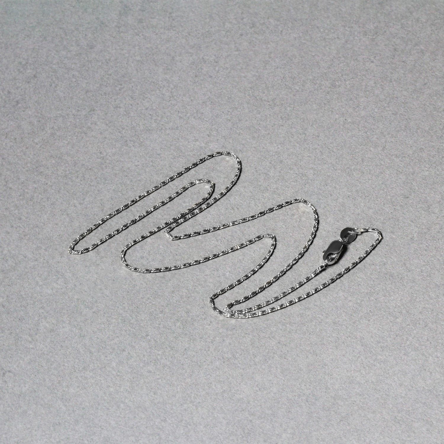 Elegant 14k white gold Lumina pendant chain showcasing a refined design and exquisite craftsmanship.