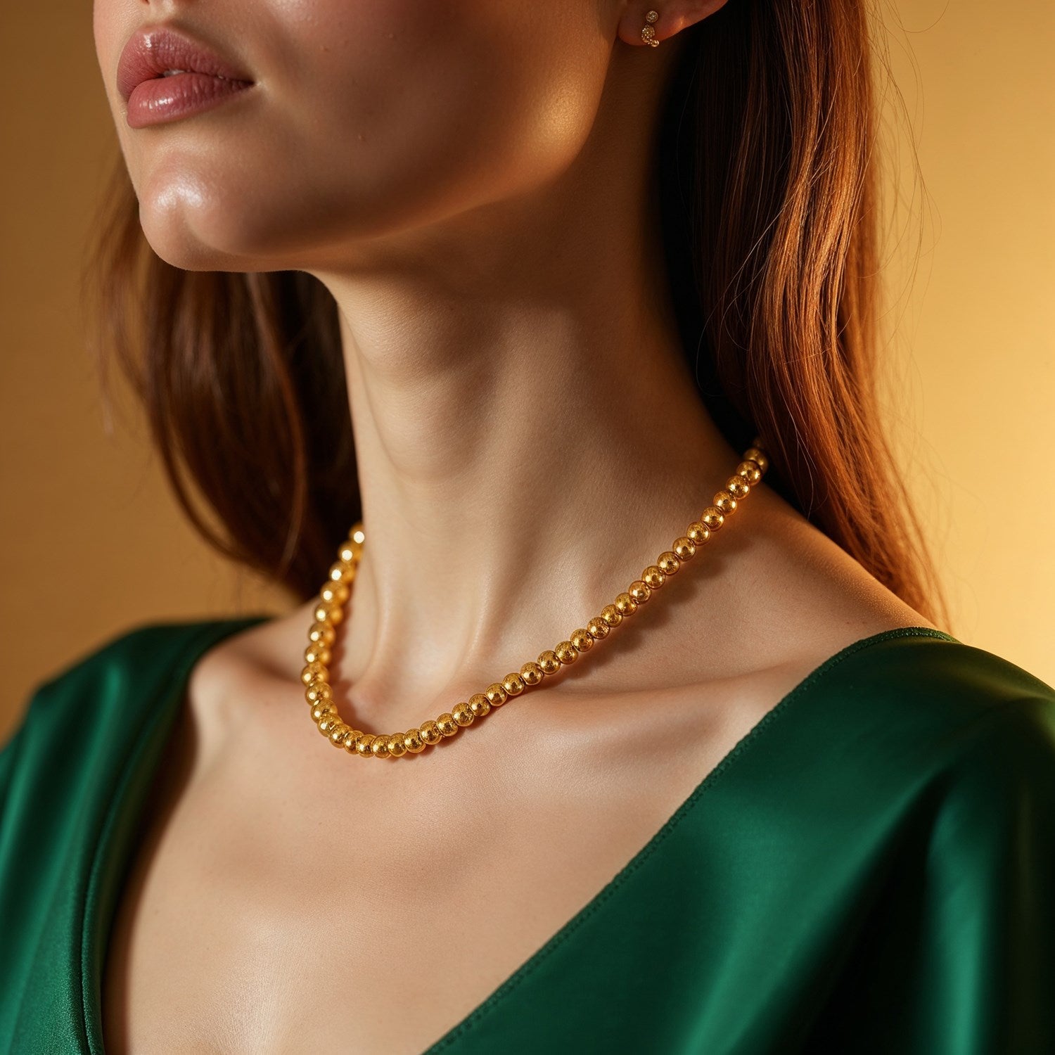 Elegant 14k yellow gold bead chain necklace featuring 3mm beads, perfect for layering or standalone sophistication.