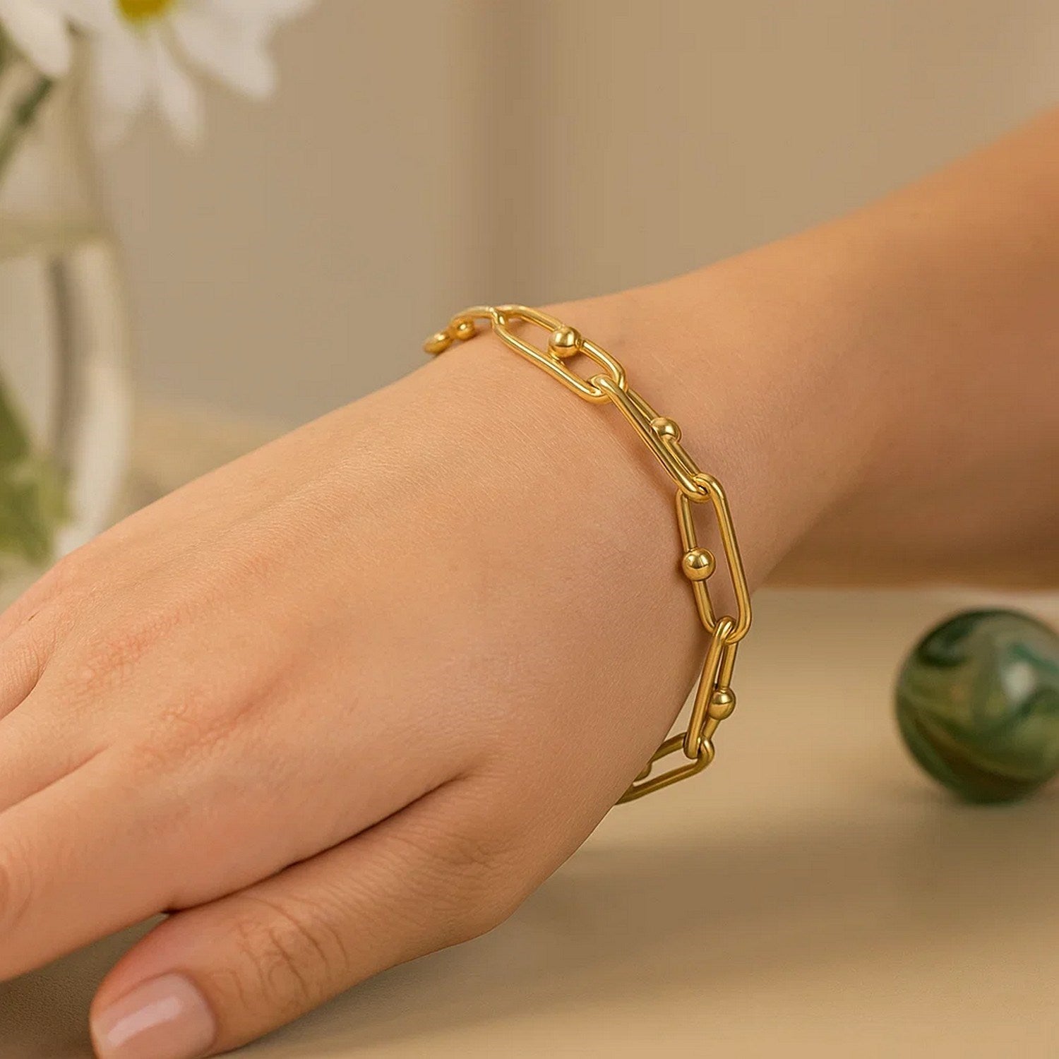14k yellow gold modern beaded oval chain bracelet, 7 3/4 inch length, showcasing exquisite craftsmanship and elegance.
