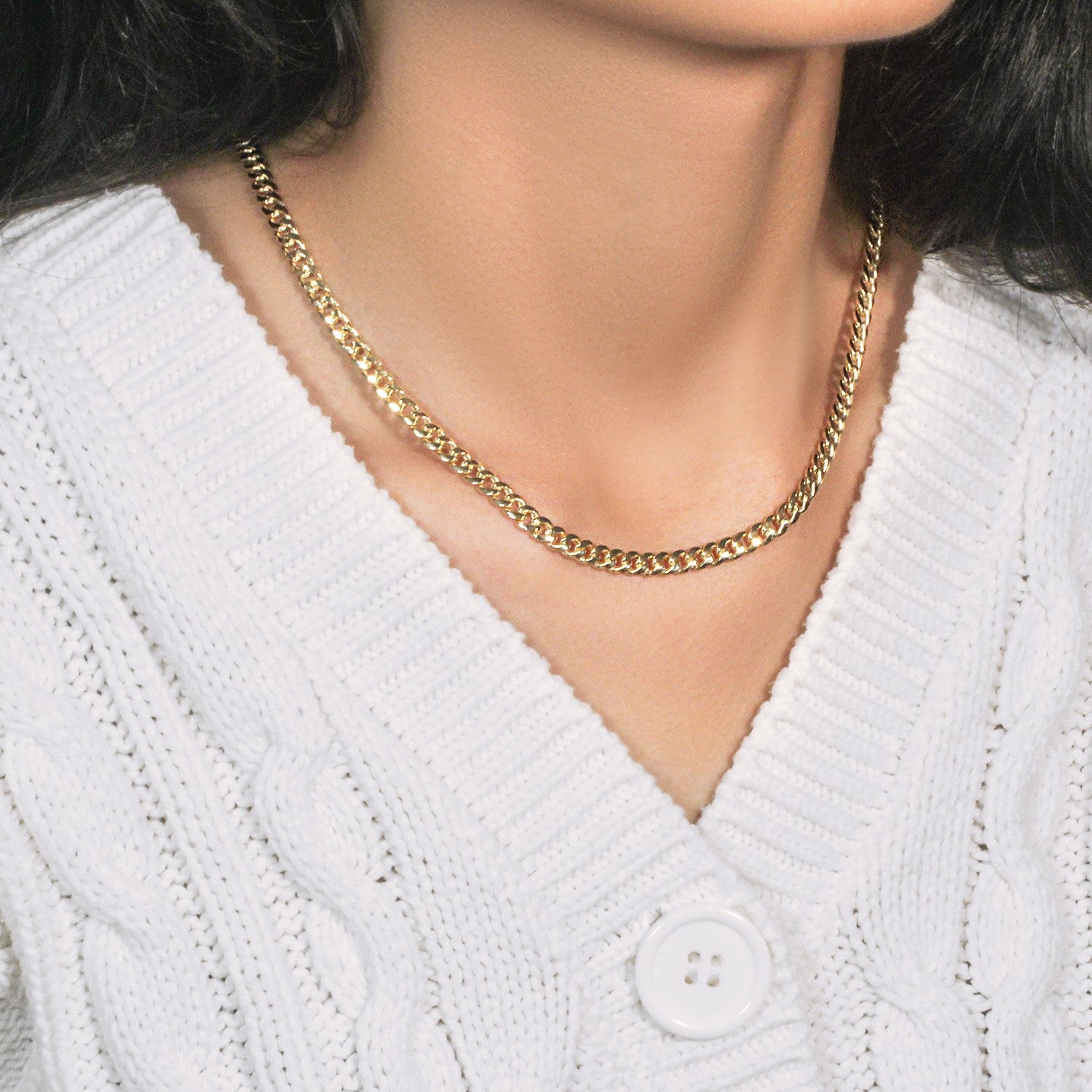 Elegant 10k yellow gold Miami Cuban semi-solid chain, 4.50 mm links, showcasing luxurious craftsmanship and style.