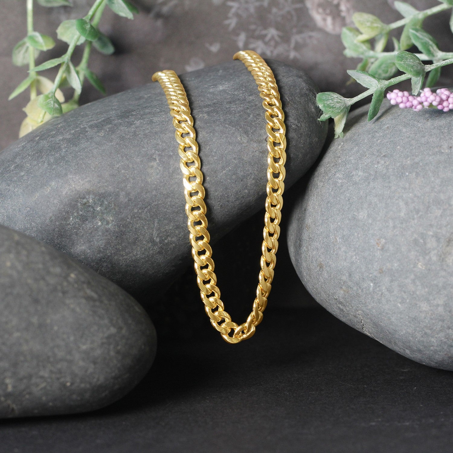 Elegant 10k yellow gold Miami Cuban semi-solid chain, 4.50 mm links, showcasing luxurious craftsmanship and style.