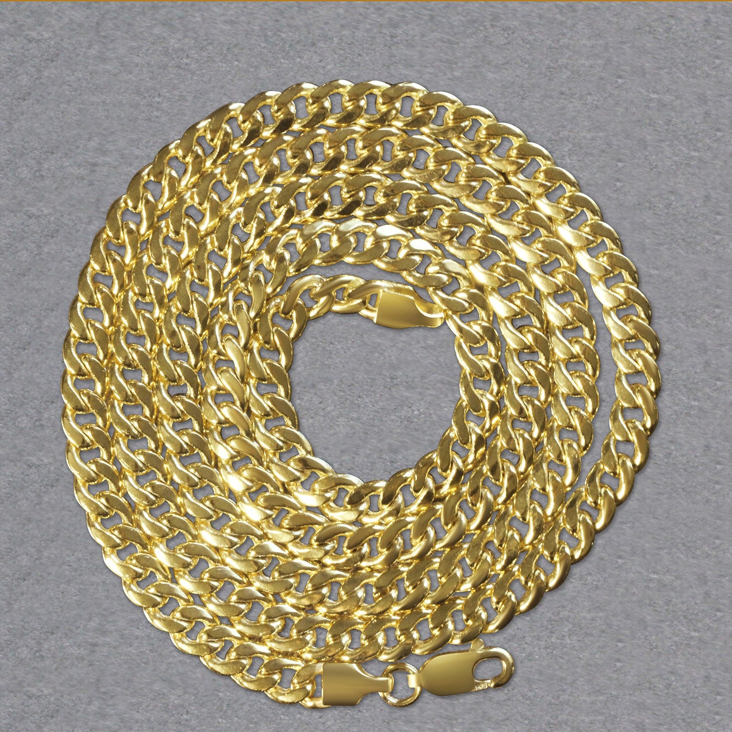 Elegant 10k yellow gold Miami Cuban semi-solid chain, 4.50 mm links, showcasing luxurious craftsmanship and style.