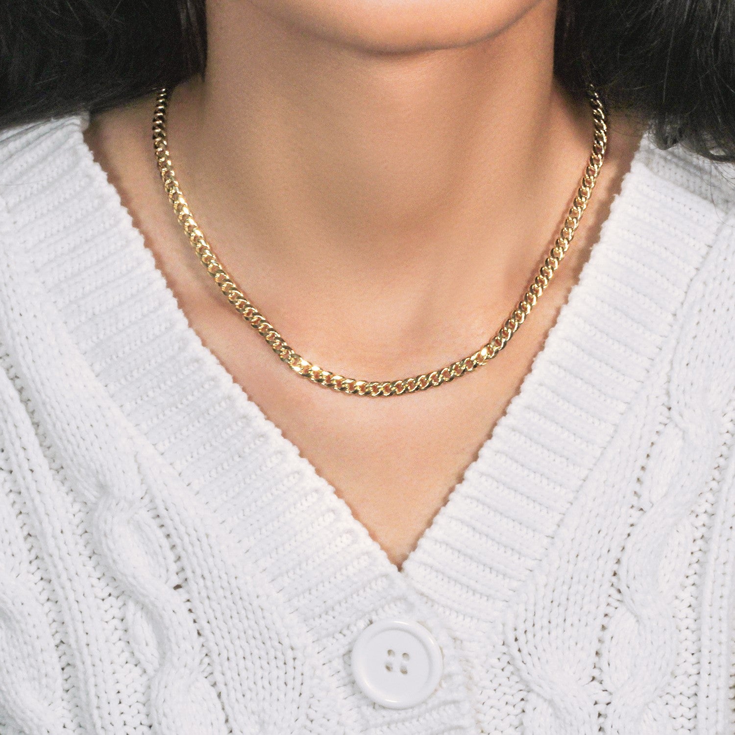 Elegant 10k yellow gold Miami Cuban semi-solid chain, 4.50 mm links, showcasing luxurious craftsmanship and style.