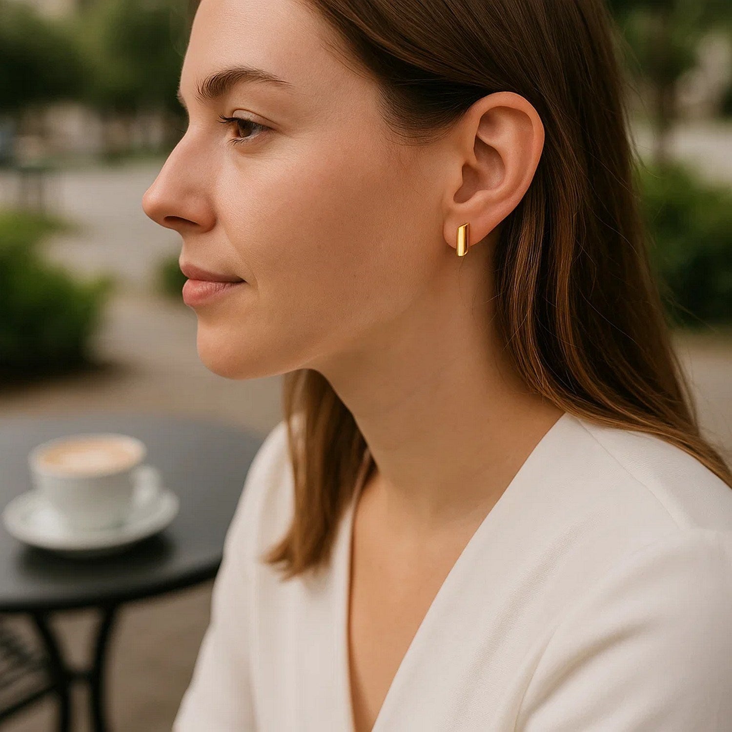 14k yellow gold polished rectangular earrings with a modern design, exuding luxury and elegance for any occasion.
