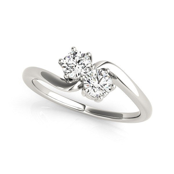 Elegant 14k white gold solitaire two stone diamond ring, showcasing exquisite craftsmanship and timeless beauty.