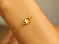 Bracelet Saturne en or jaune 14 carats