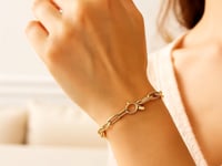 Armband i 14K gult guld med charmlås och gemkedja