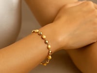 Браслет из жёлтого золота 14K с полировкой и сатинированной отделкой в виде гальки (6.00 мм)