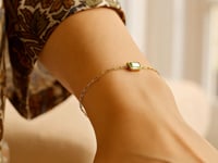 Браслет из жёлтого золота 14K с перидотом в виде скрепки (1.50 мм)