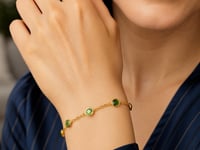 14 Karat Gelbgold Peridot Station Armband