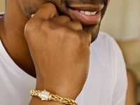 Bracciale in corda intrecciata con chiusura con diamanti in oro giallo 14k
