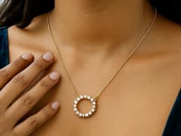 14K gult guld diamantring med oroli-cirkel