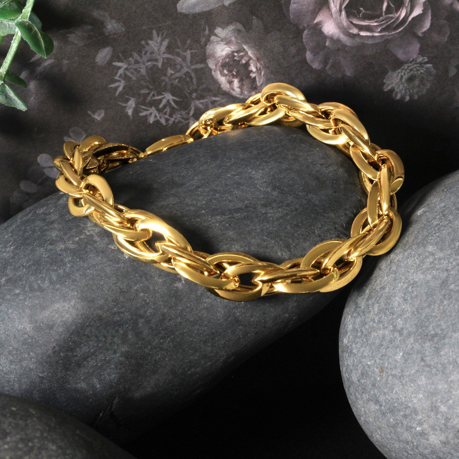 14k yellow gold double oval link chain bracelet with a contemporary design, showcasing elegance and luxury.
