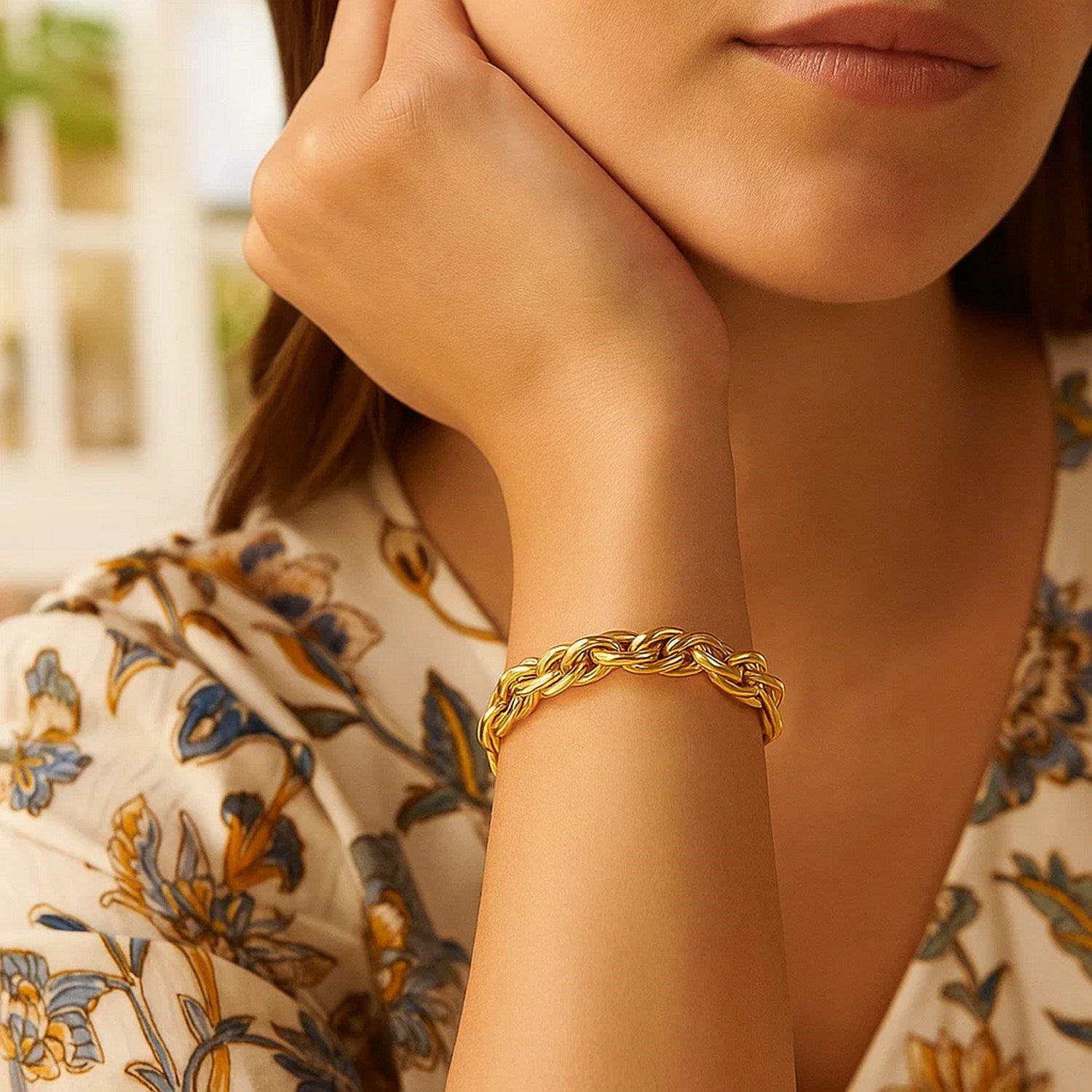 14k yellow gold contemporary double oval link chain bracelet, showcasing elegant design and luxurious craftsmanship.