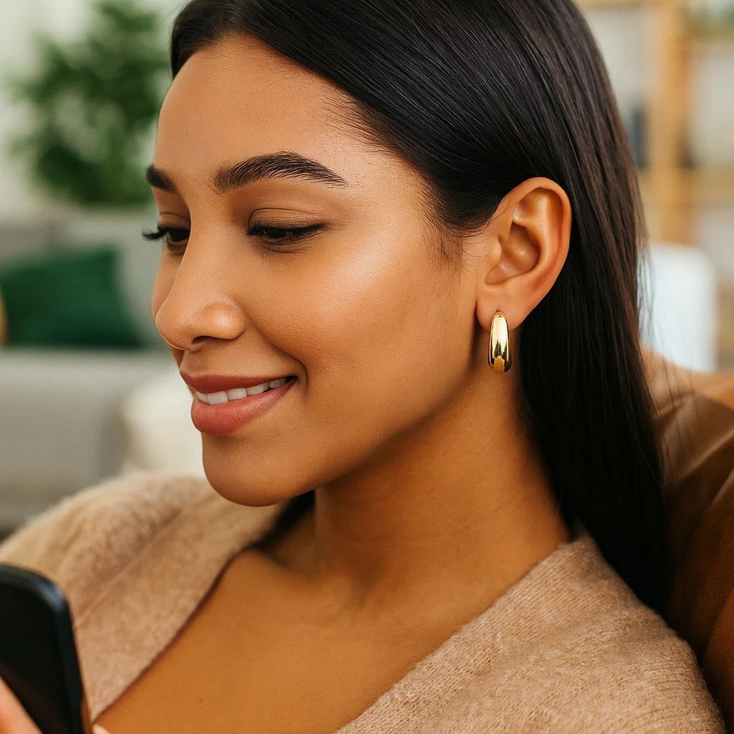 14k yellow gold large tapered hoop earrings showcasing a sleek modern design, perfect for elegant occasions.
