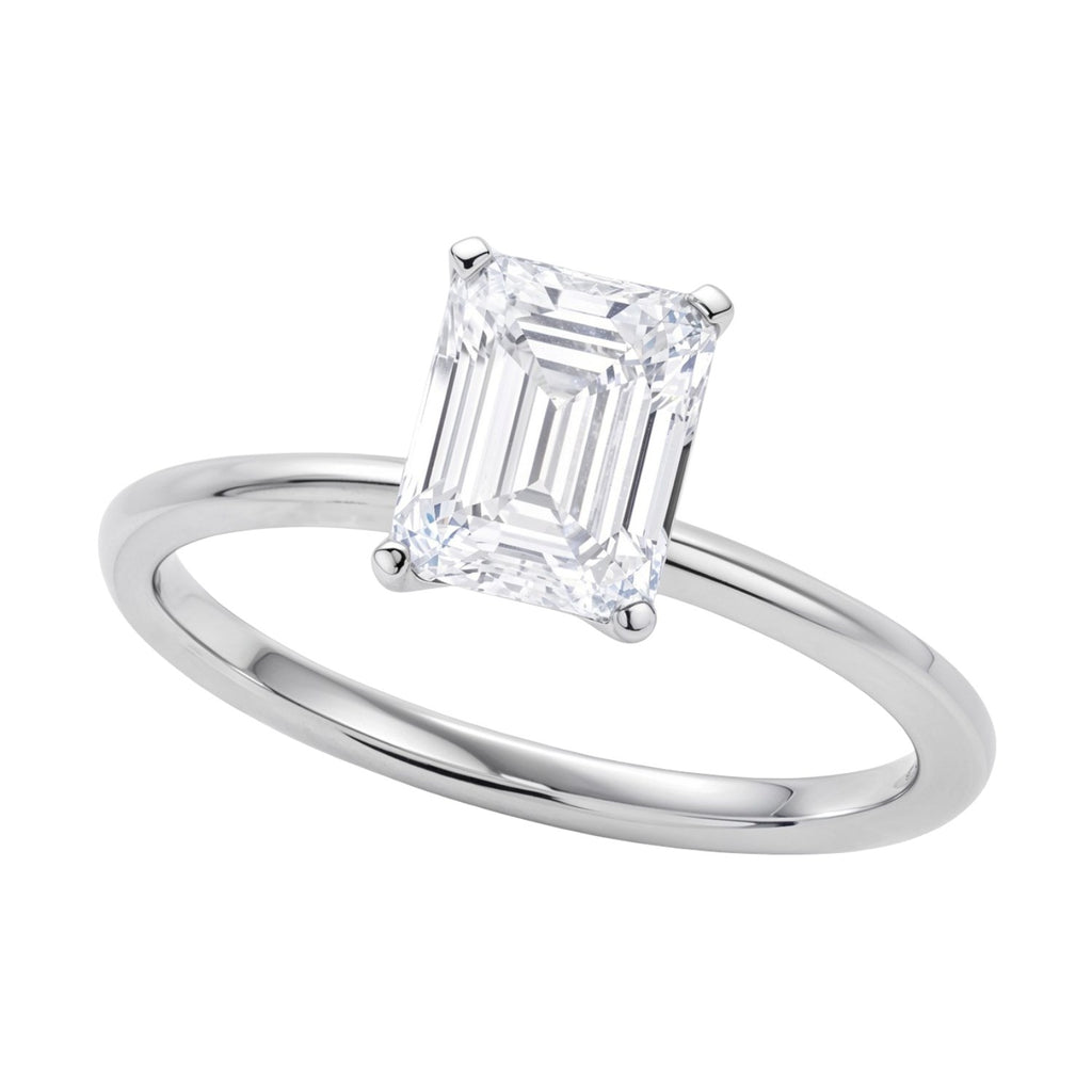 1 1/2 carat emerald lab-grown diamond solitaire ring in 14k white gold with elegant prong setting, modern luxury design.