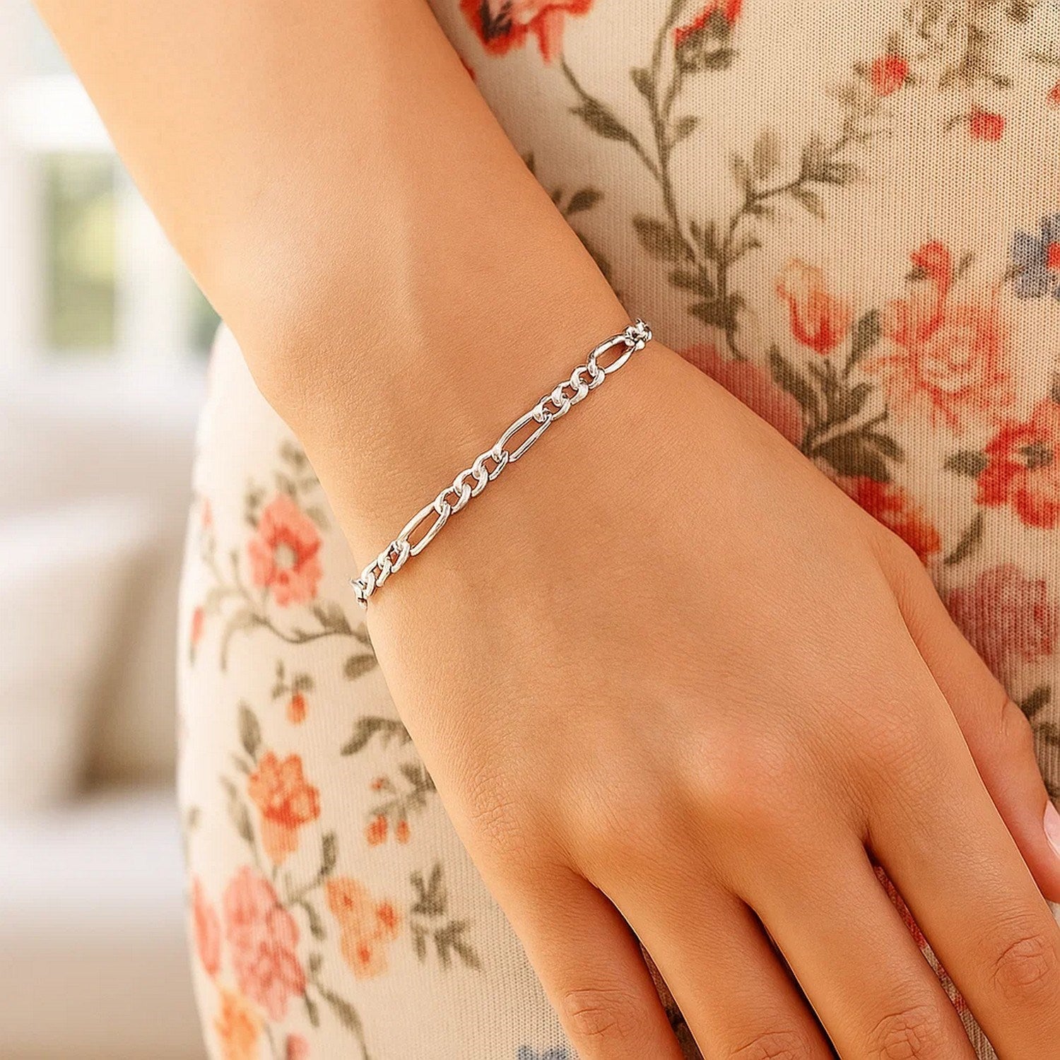 Elegant 14k white gold solid Figaro bracelet featuring classic link design, perfect for luxury jewelry enthusiasts.