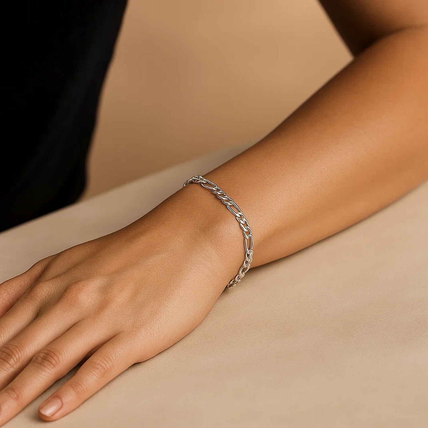 14k white gold solid Figaro bracelet featuring classic links, elegantly crafted for timeless luxury.