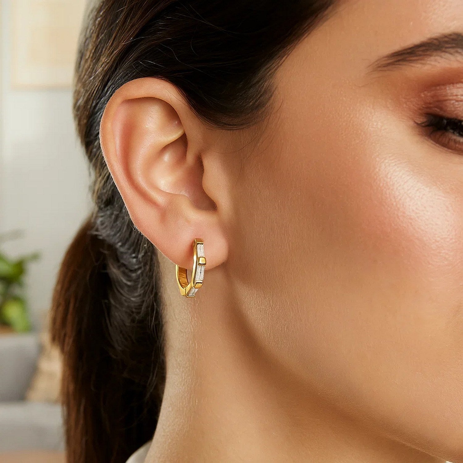 14k yellow gold petite octagonal hoop earrings adorned with sparkling cubic zirconias for a modern elegance.
