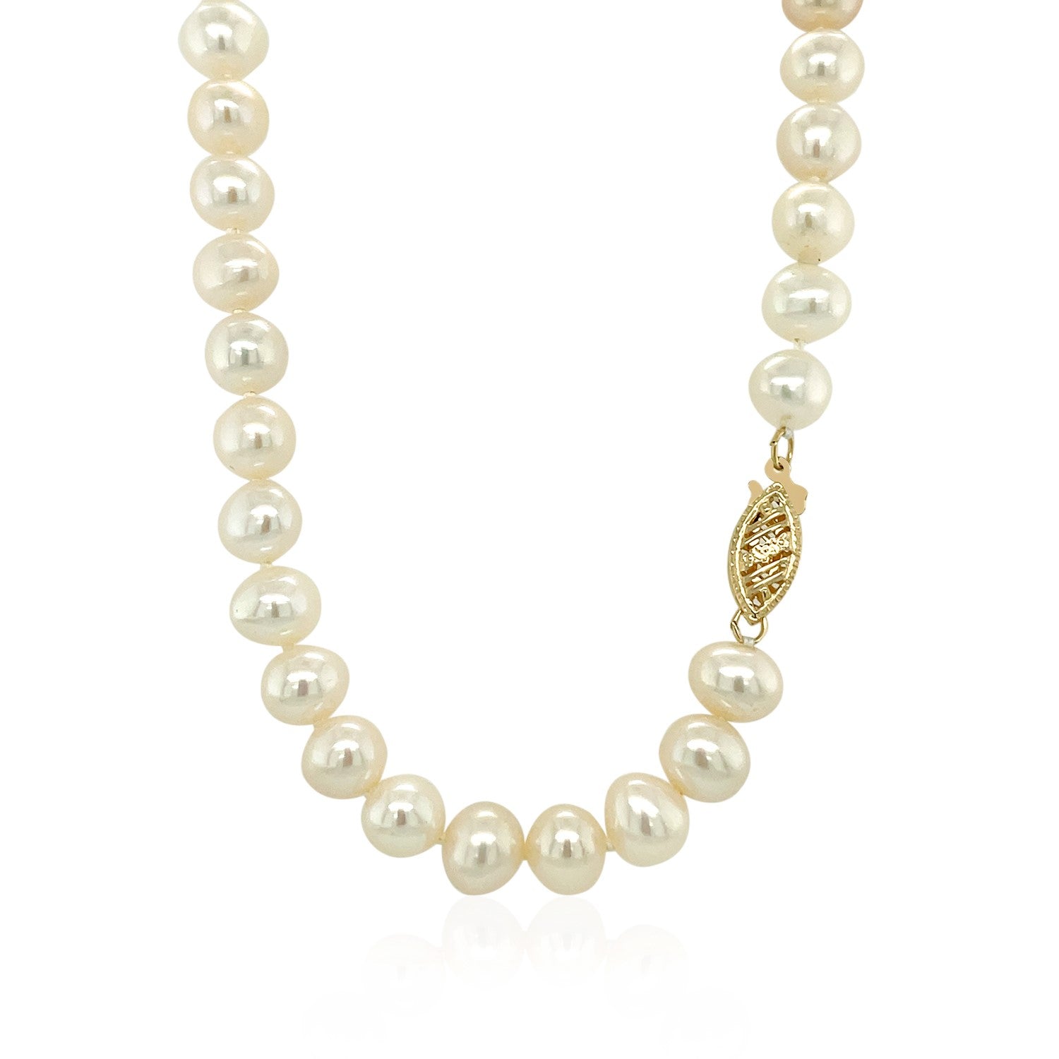 14k yellow gold modern necklace adorned with round white freshwater cultured pearls, 6.0mm to 6.5mm in size.