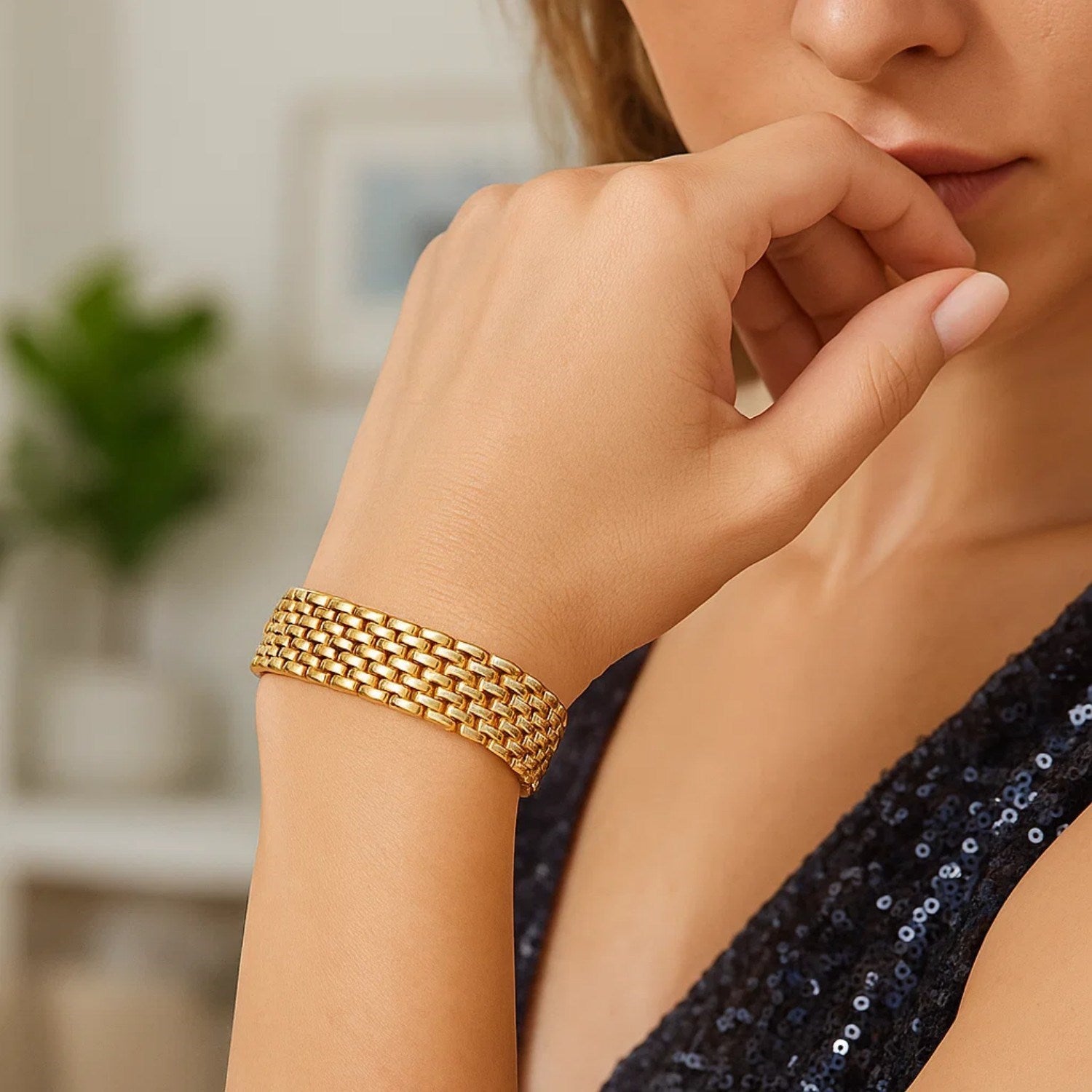 14k yellow gold flexible panther line bracelet, modern design with elegant links, showcasing luxury craftsmanship.