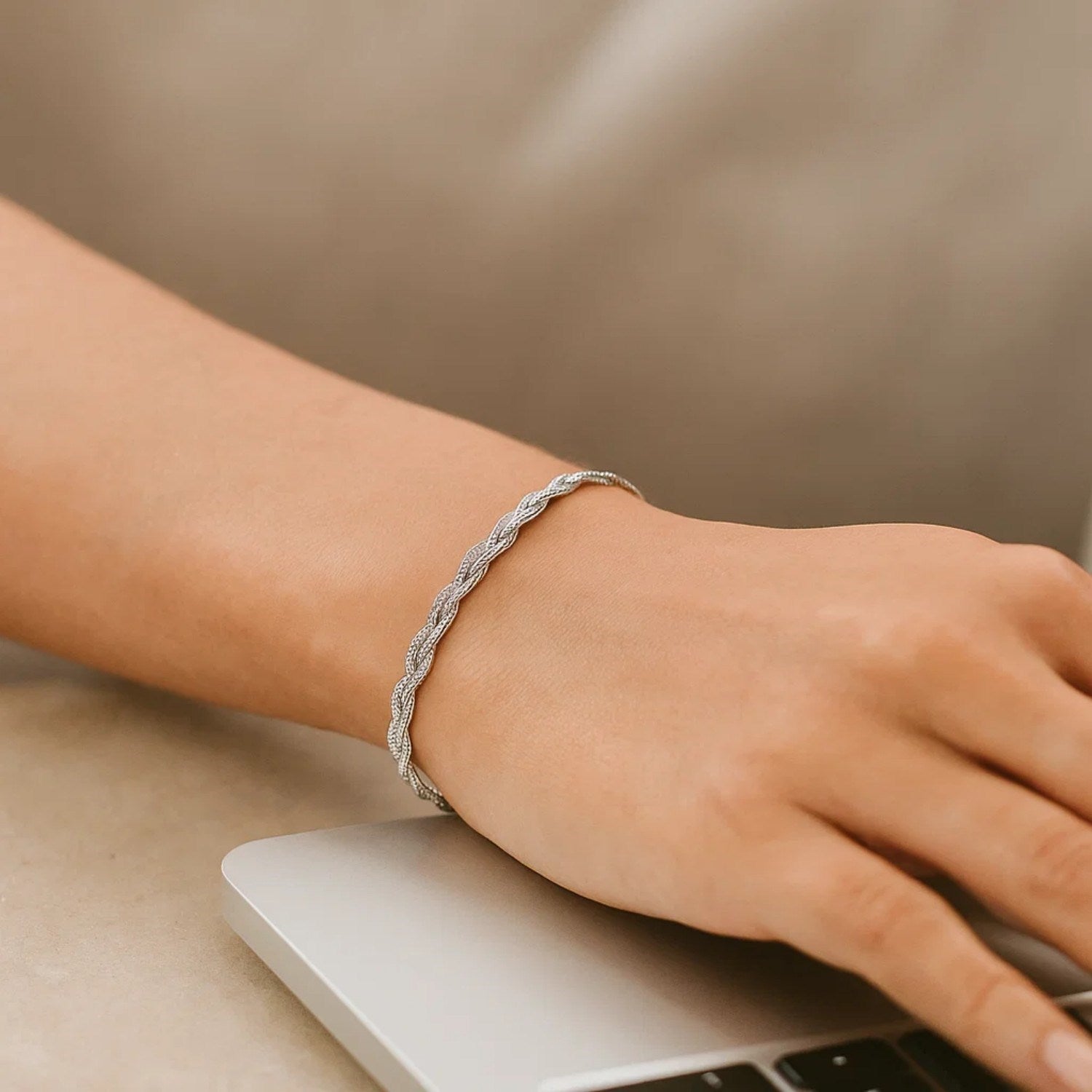 14k white gold braided bracelet featuring a classic chain design, perfect for elegant layering or standalone wear.