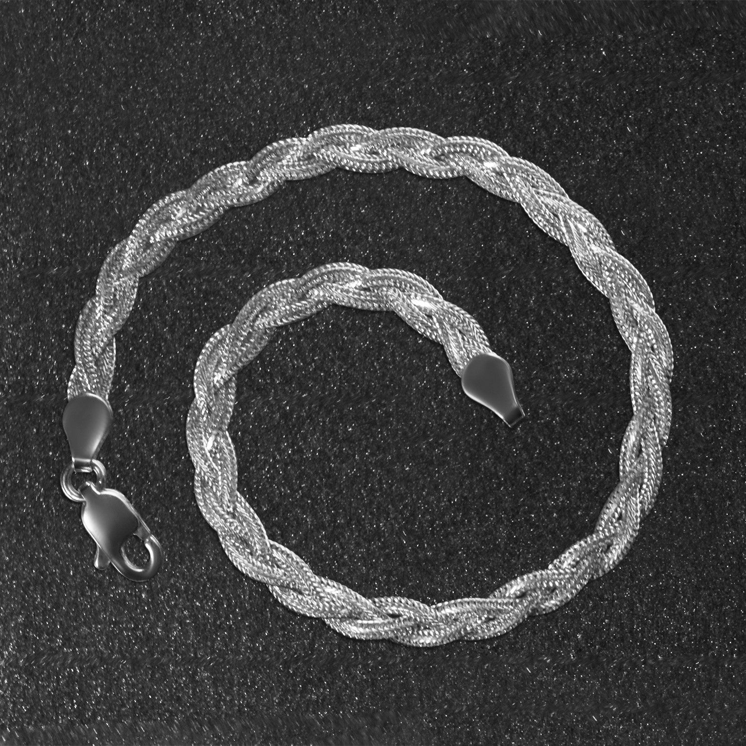 14k white gold braided bracelet featuring a classic design and elegant chain detail, perfect for luxury styling.