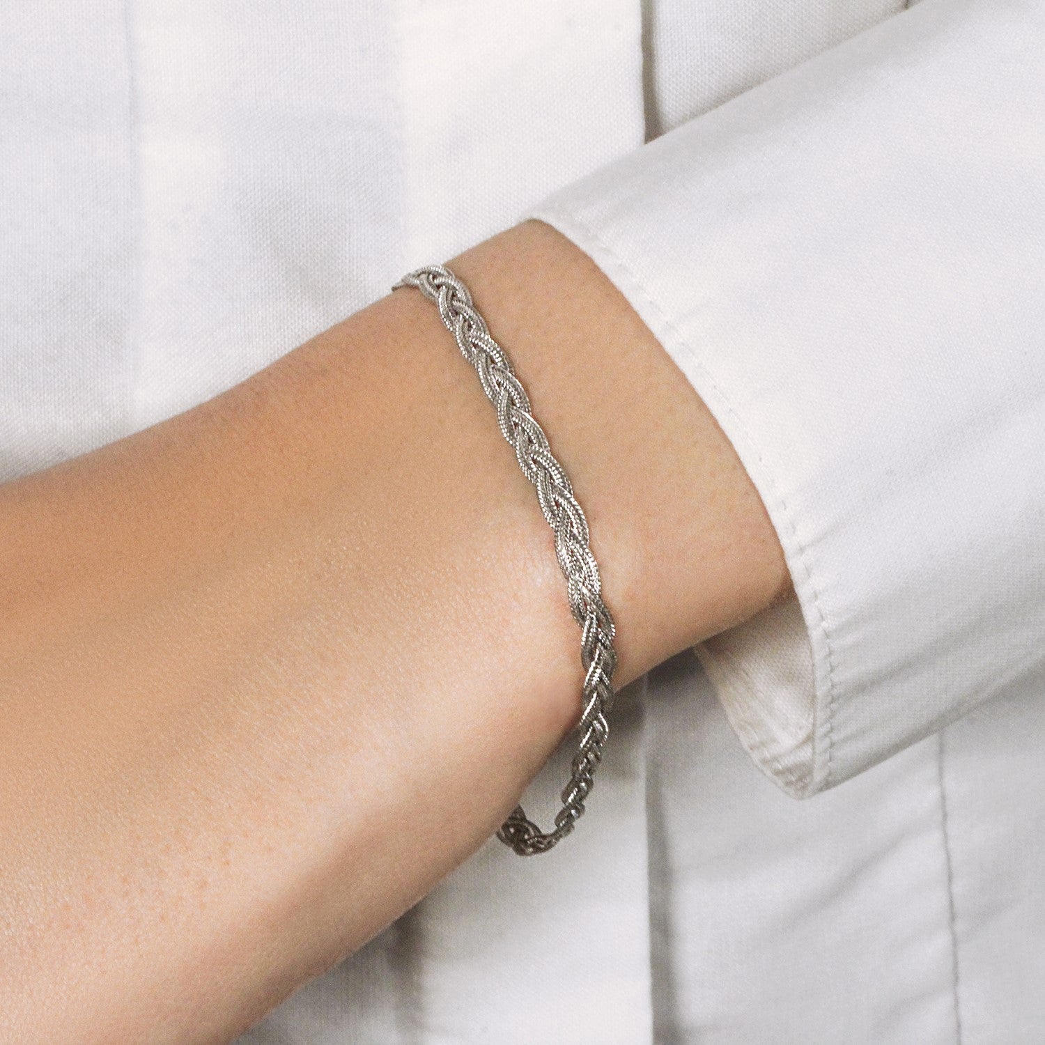 14k white gold braided bracelet featuring a classic chain design, perfect for elegant layering or standalone wear.