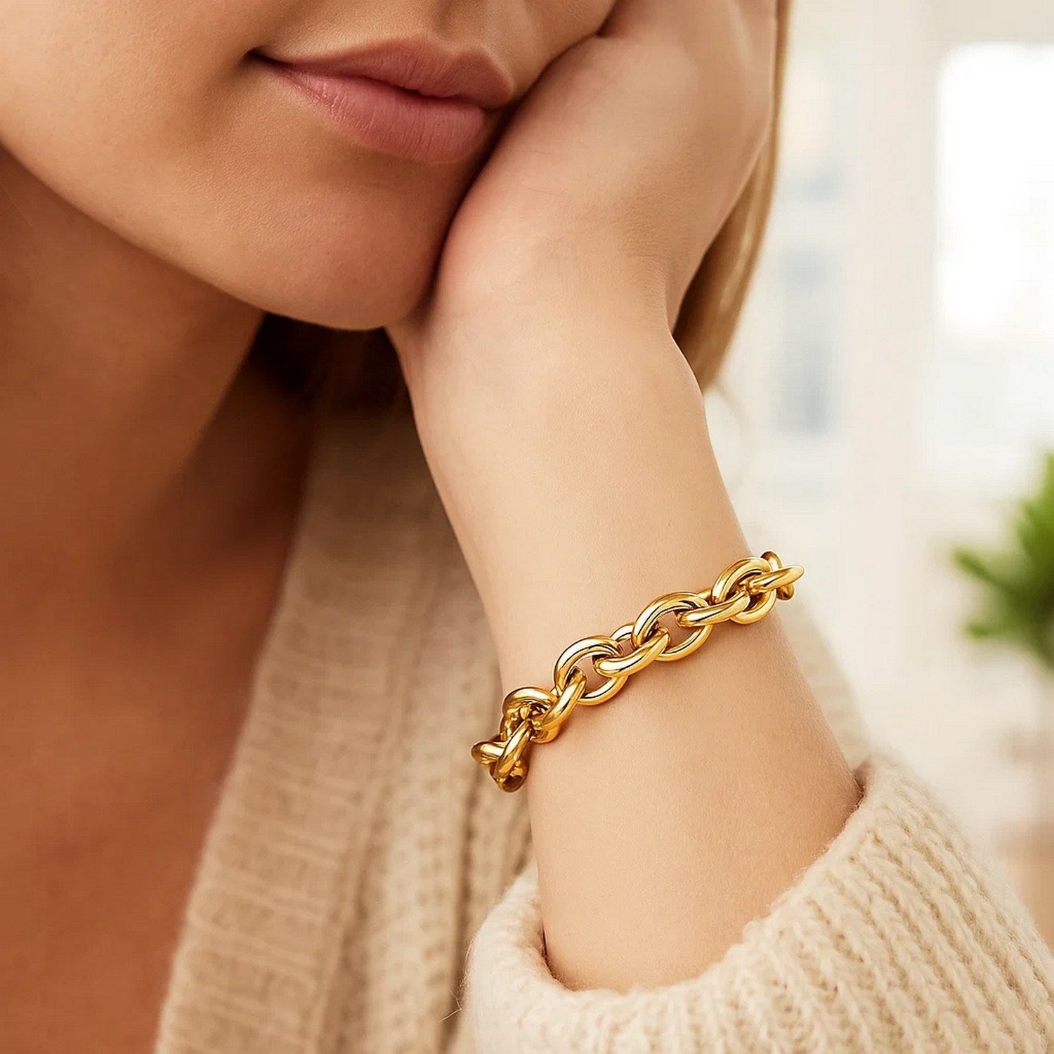 14k yellow gold polished cable motif bracelet with a modern design, showcasing a luxurious chain detail.