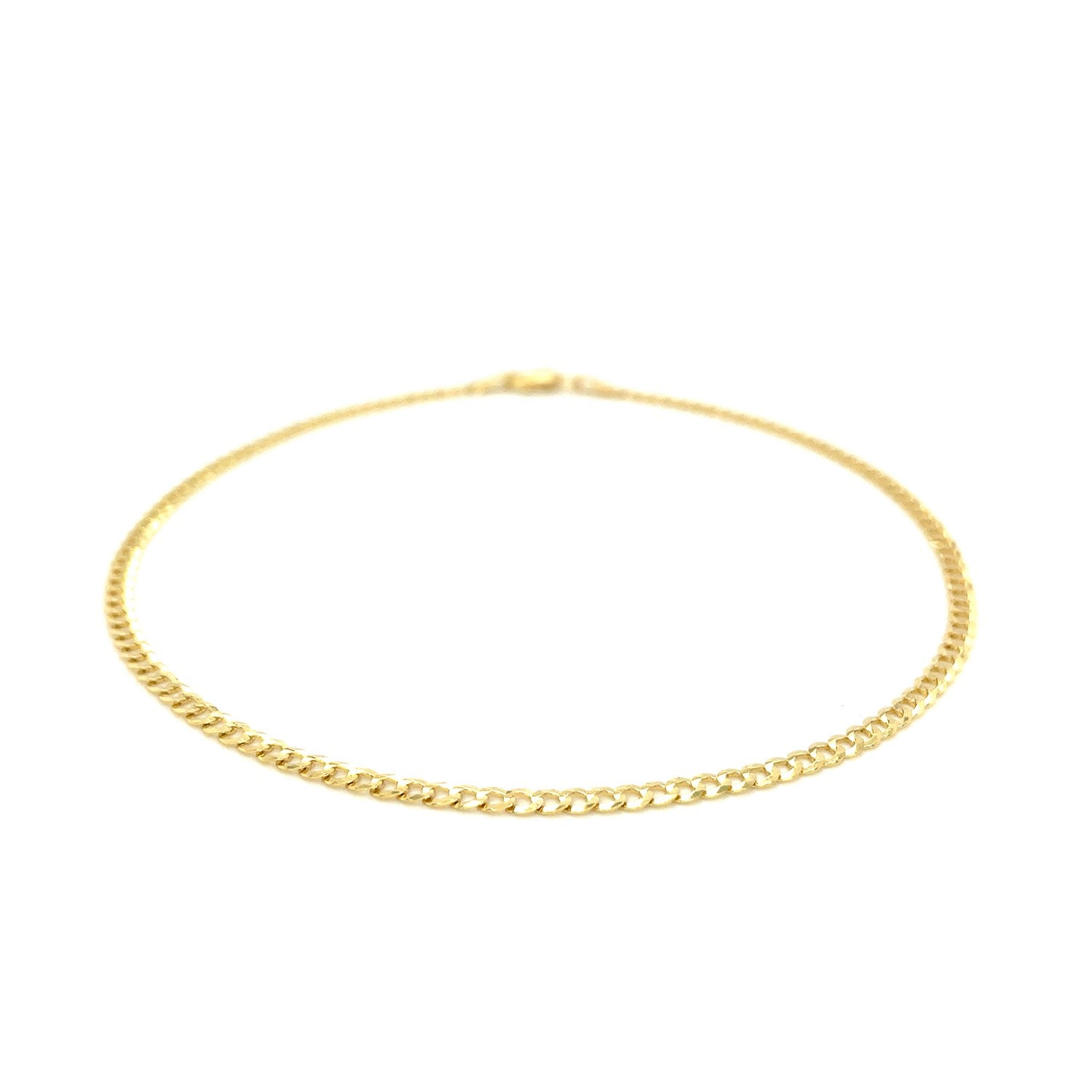 14k yellow gold curb link anklet with a modern design, showcasing elegant craftsmanship and timeless luxury.