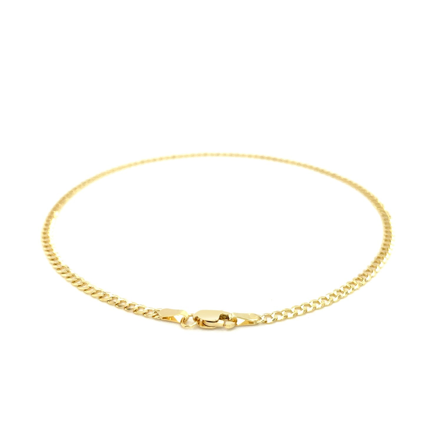 14k yellow gold curb link anklet with a modern design, showcasing elegant links for a luxurious touch.
