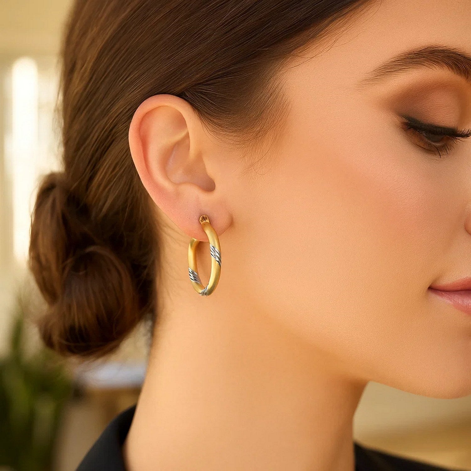 14k two-tone gold polished hoop earrings featuring a sleek modern design, perfect for elegant occasions.