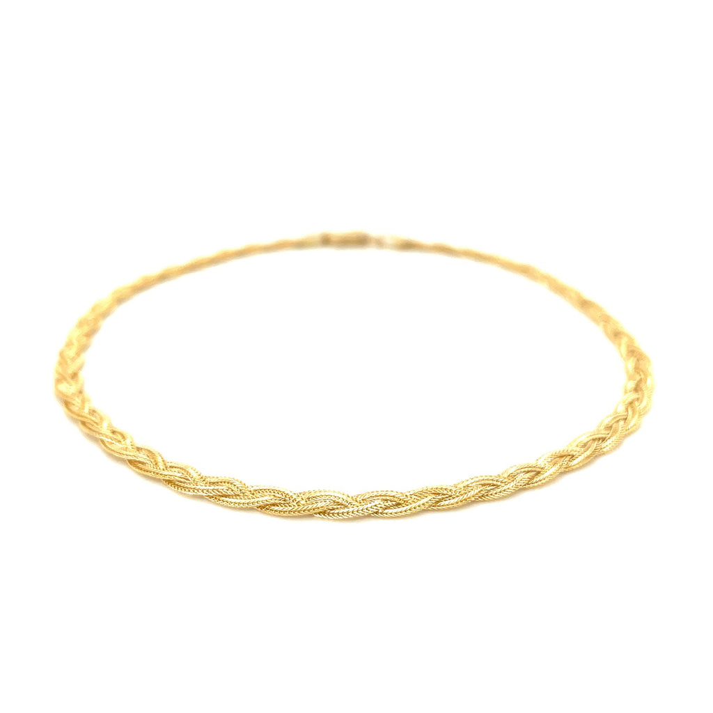 14k yellow gold braided bracelet showcasing modern luxury with a 3.50 mm width, perfect for elegant styling.