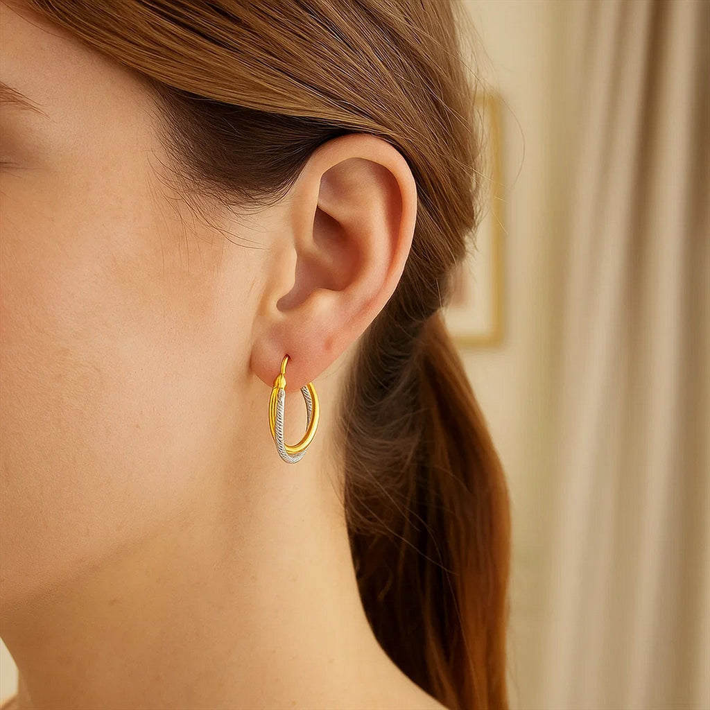 14k two-tone gold textured polished hoop earrings, showcasing modern elegance and luxurious craftsmanship.