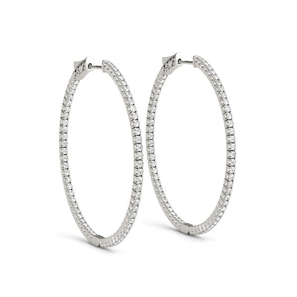 14k white gold polished hoop earrings featuring round diamonds in a modern prong setting for a luxurious touch.