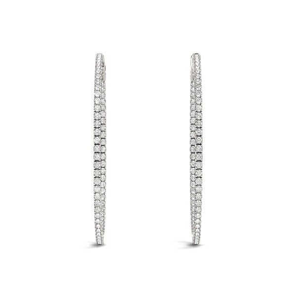 14k white gold polished hoop earrings featuring round diamonds in a modern prong setting, perfect for elegant occasions.