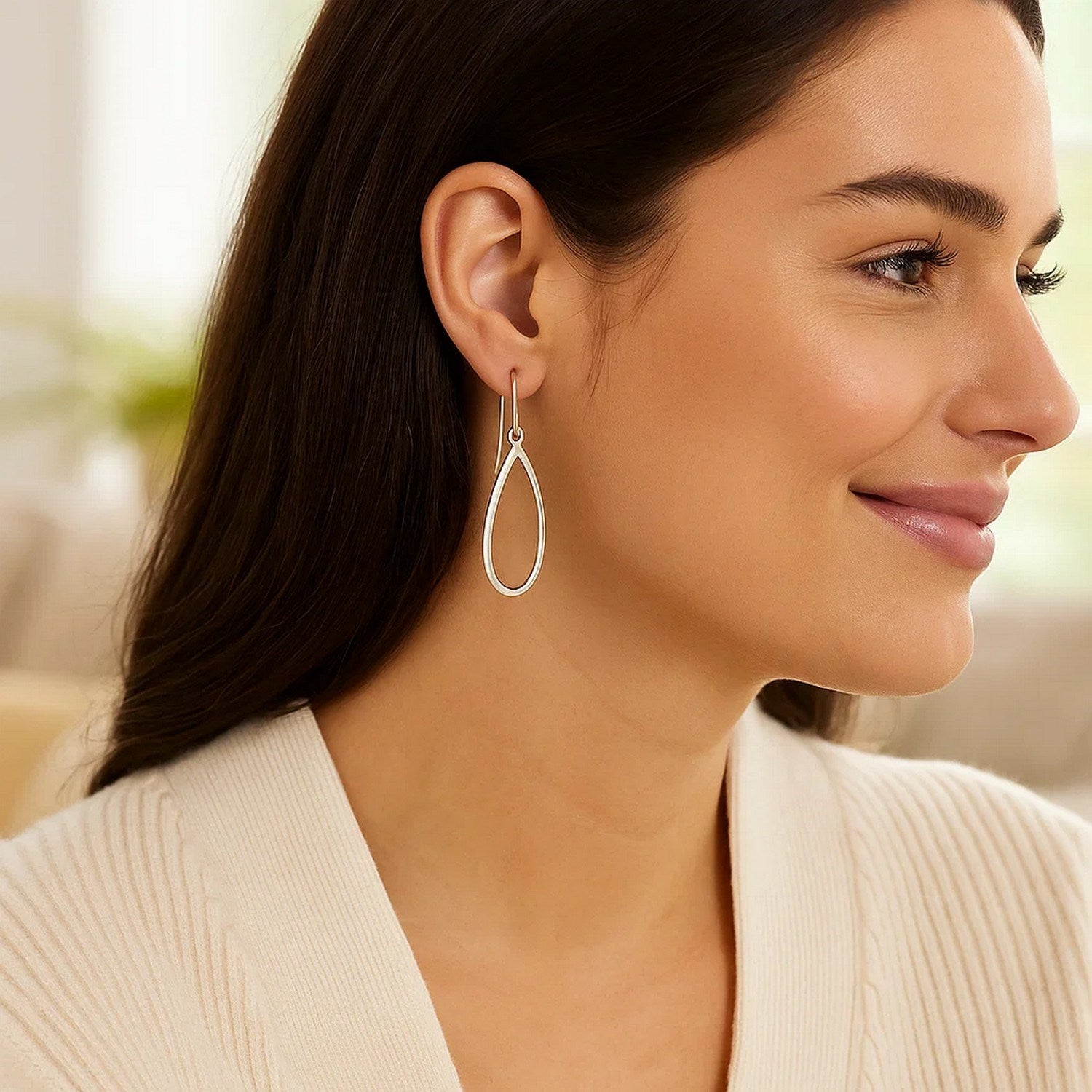 14k white gold polished dangle earrings featuring a sleek modern design and elegant drop silhouette.