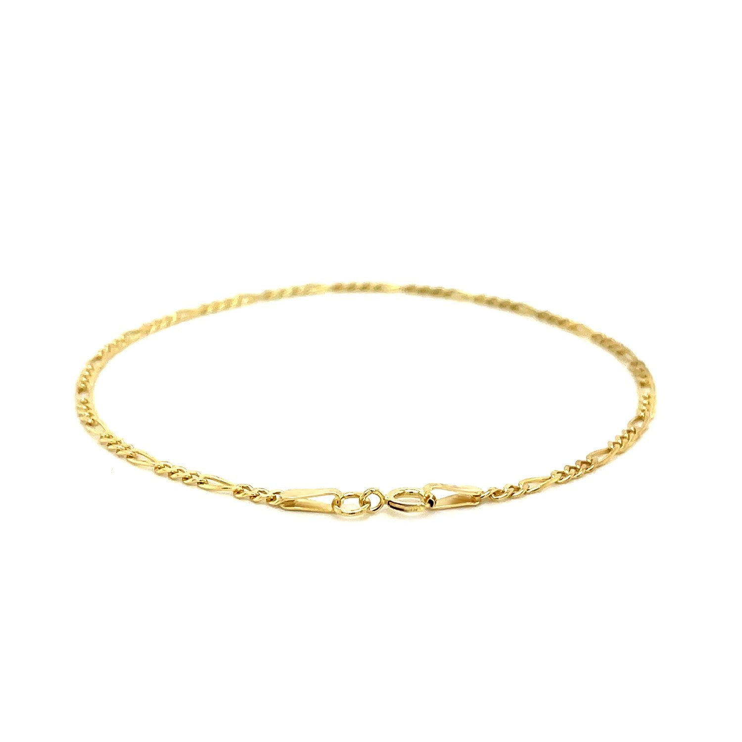 14k yellow gold Figaro anklet with modern chain design, featuring elegant stud accents for a luxurious touch.